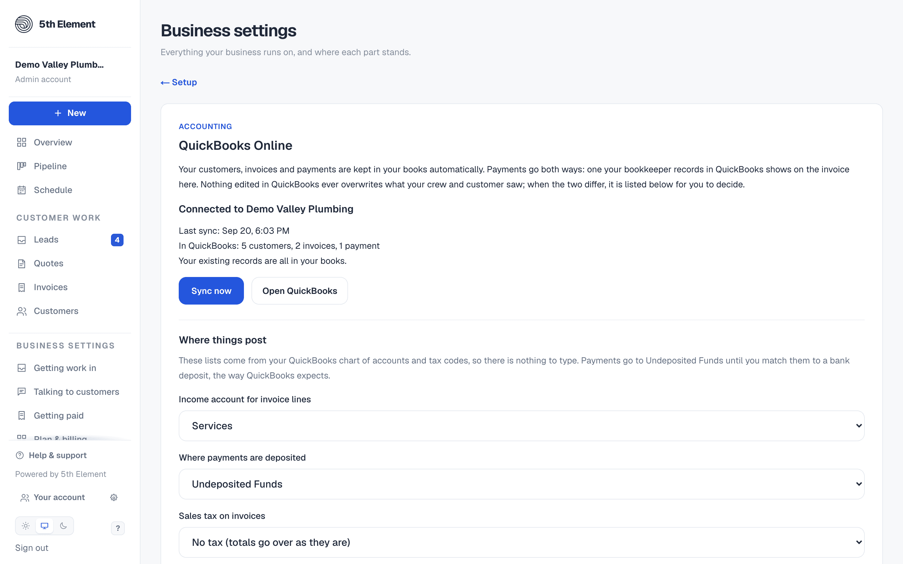 The QuickBooks Online card in Business settings, connected: the last sync, what is in QuickBooks, Sync now, and where invoice lines and payments post.